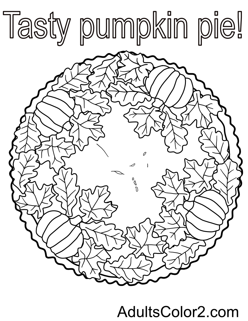 Fancy pumpkin pie with leaves and pumpkin cutouts.