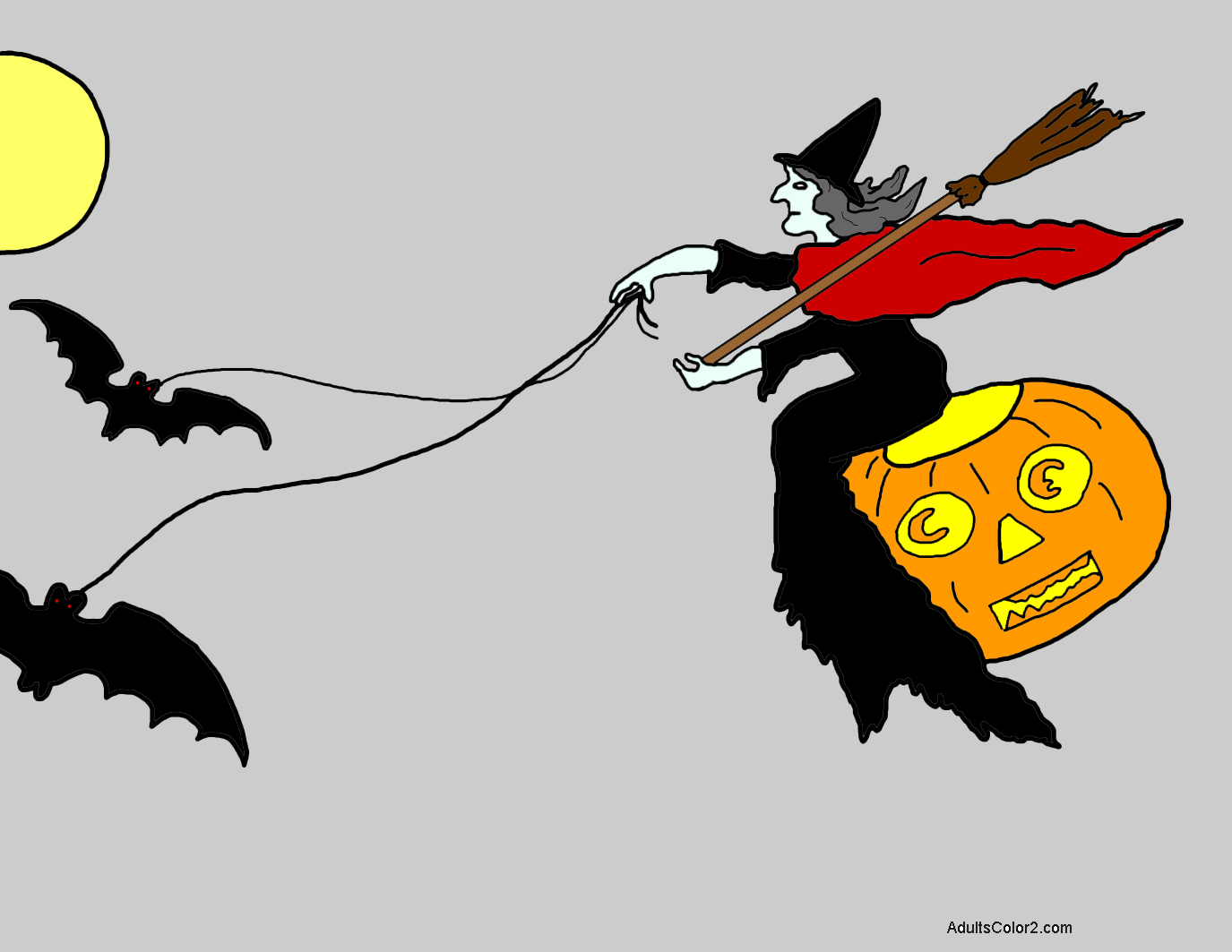 Witch riding on a carved pumpkin.